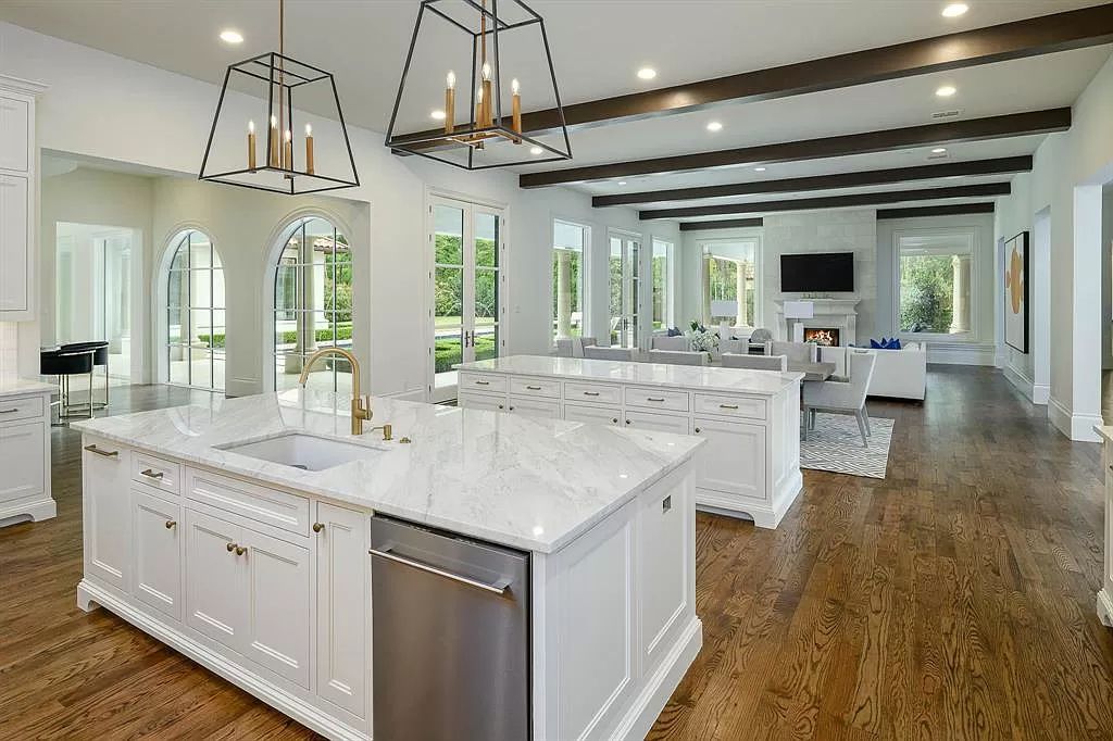 The Custom Home in Texas is a sophisticated Preston Hollow Estate masterfully custom built in 2018 on lushly landscaped now available for sale. This home located at 5400 Edlen Dr, Dallas, Texas; offering 5 bedrooms and 10 bathrooms with over 15,900 square feet of living spaces.