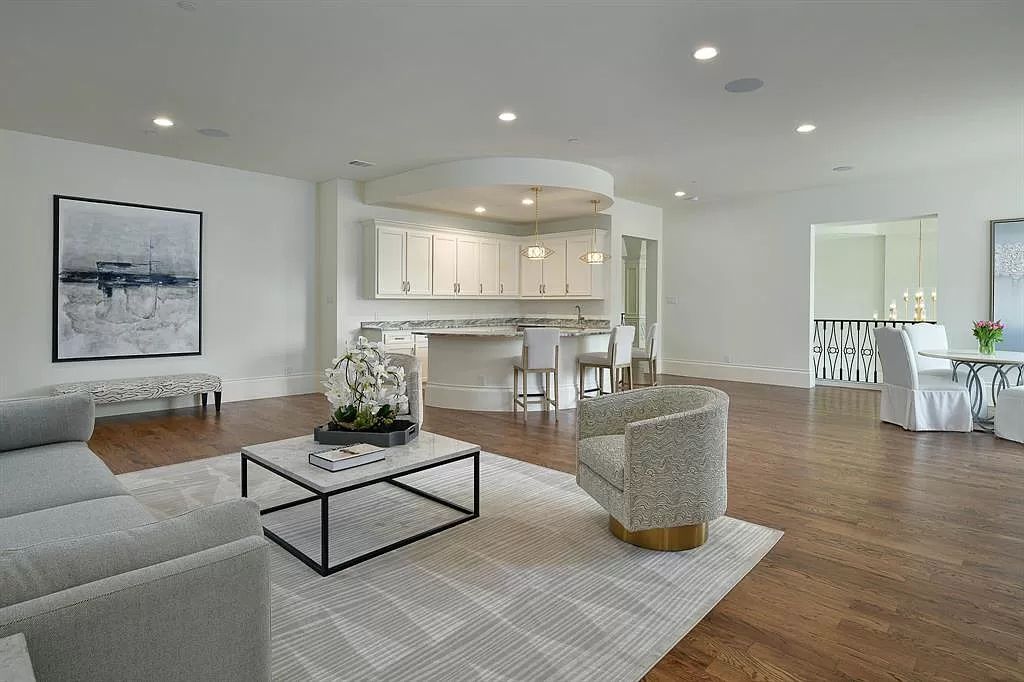 The Custom Home in Texas is a sophisticated Preston Hollow Estate masterfully custom built in 2018 on lushly landscaped now available for sale. This home located at 5400 Edlen Dr, Dallas, Texas; offering 5 bedrooms and 10 bathrooms with over 15,900 square feet of living spaces.