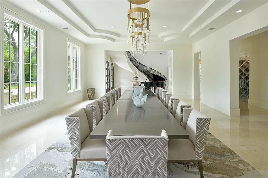 The Custom Home in Texas is a sophisticated Preston Hollow Estate masterfully custom built in 2018 on lushly landscaped now available for sale. This home located at 5400 Edlen Dr, Dallas, Texas; offering 5 bedrooms and 10 bathrooms with over 15,900 square feet of living spaces.