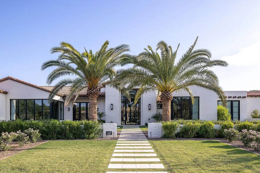 The Modern Hacienda in Coveted Paradise Valley is a luxurious custom home with remarkable quality & workmanship now available for sale. This home located at 5353 E Sanna St, Paradise Valley, Arizona; offering 5 bedrooms and 6 bathrooms with over 6,600 square feet of living spaces.