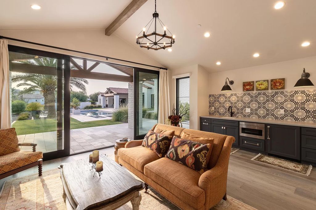 The Modern Hacienda in Coveted Paradise Valley is a luxurious custom home with remarkable quality & workmanship now available for sale. This home located at 5353 E Sanna St, Paradise Valley, Arizona; offering 5 bedrooms and 6 bathrooms with over 6,600 square feet of living spaces.