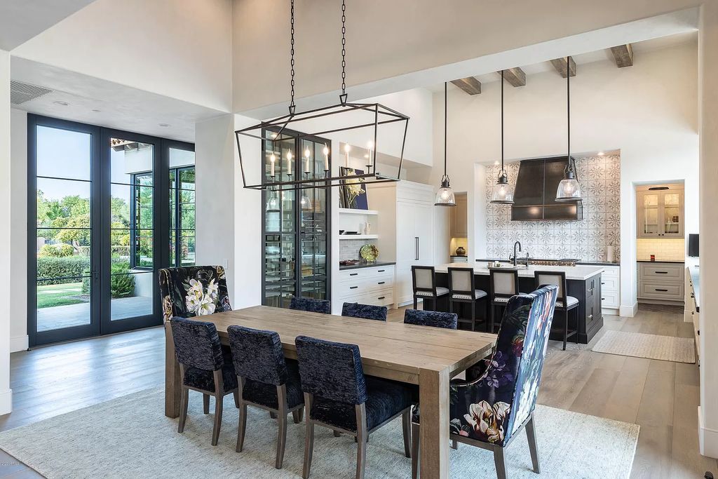 The Modern Hacienda in Coveted Paradise Valley is a luxurious custom home with remarkable quality & workmanship now available for sale. This home located at 5353 E Sanna St, Paradise Valley, Arizona; offering 5 bedrooms and 6 bathrooms with over 6,600 square feet of living spaces.