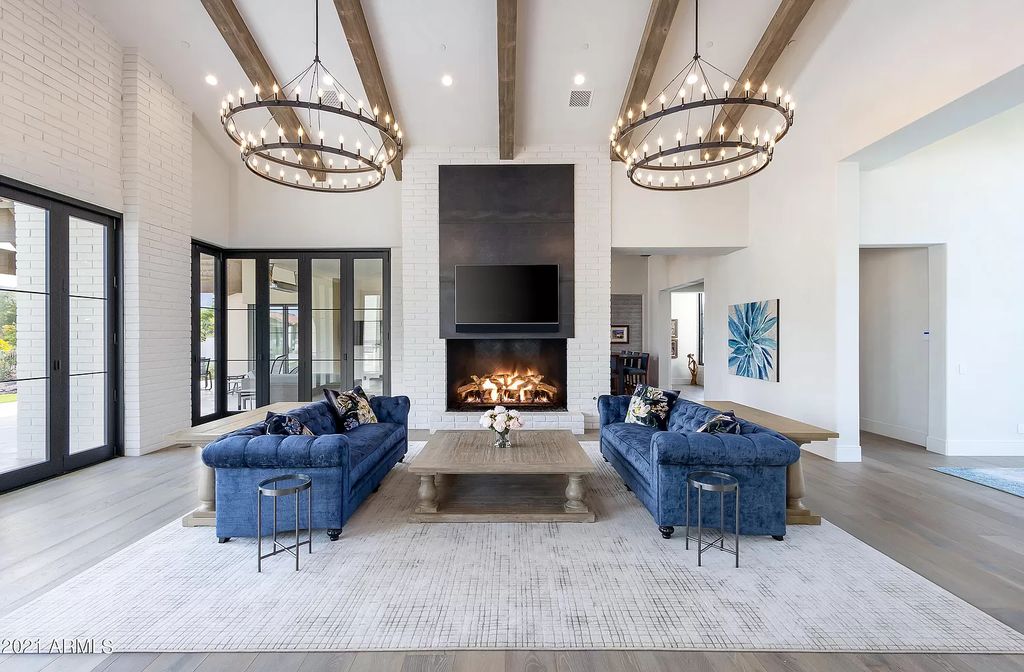 The Modern Hacienda in Coveted Paradise Valley is a luxurious custom home with remarkable quality & workmanship now available for sale. This home located at 5353 E Sanna St, Paradise Valley, Arizona; offering 5 bedrooms and 6 bathrooms with over 6,600 square feet of living spaces.