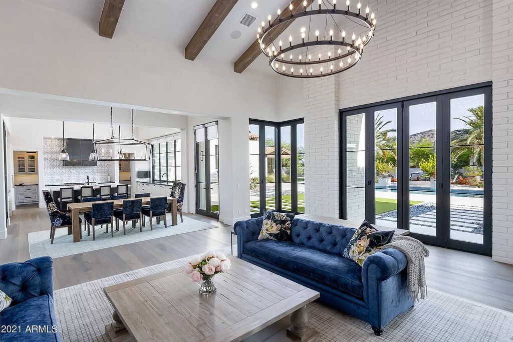 The Modern Hacienda in Coveted Paradise Valley is a luxurious custom home with remarkable quality & workmanship now available for sale. This home located at 5353 E Sanna St, Paradise Valley, Arizona; offering 5 bedrooms and 6 bathrooms with over 6,600 square feet of living spaces.