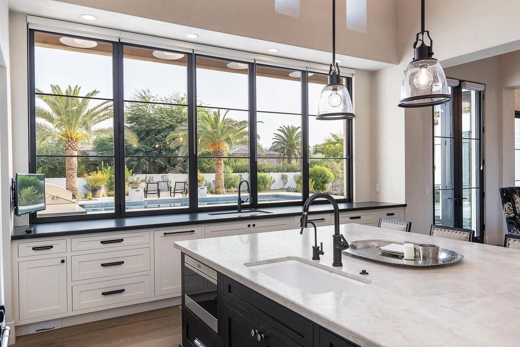 The Modern Hacienda in Coveted Paradise Valley is a luxurious custom home with remarkable quality & workmanship now available for sale. This home located at 5353 E Sanna St, Paradise Valley, Arizona; offering 5 bedrooms and 6 bathrooms with over 6,600 square feet of living spaces.