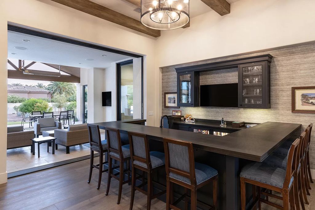 The Modern Hacienda in Coveted Paradise Valley is a luxurious custom home with remarkable quality & workmanship now available for sale. This home located at 5353 E Sanna St, Paradise Valley, Arizona; offering 5 bedrooms and 6 bathrooms with over 6,600 square feet of living spaces.
