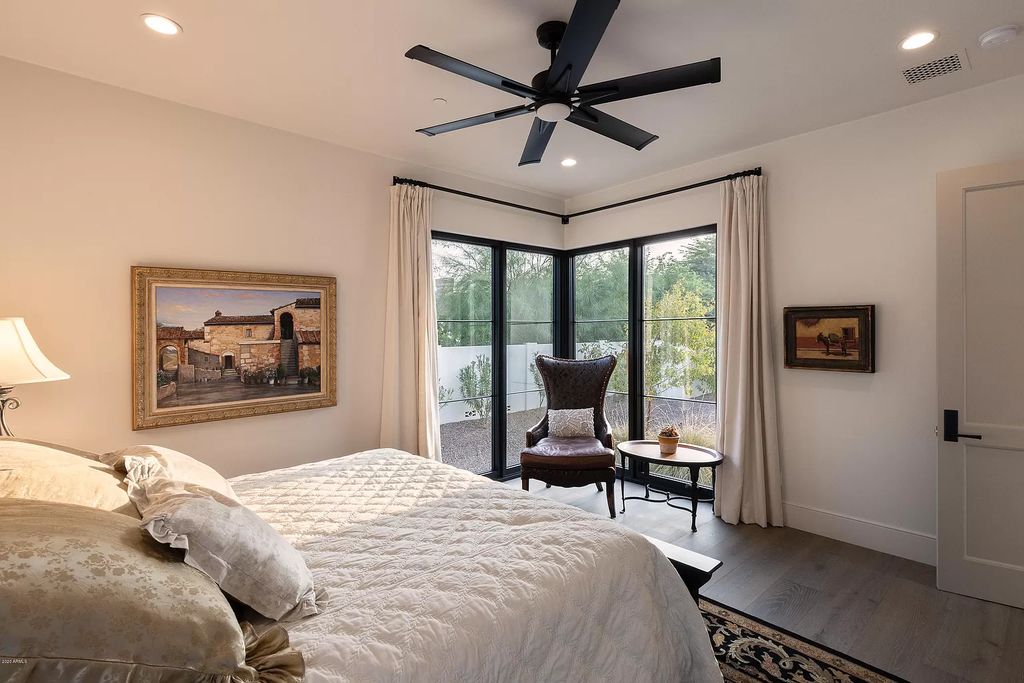 The Modern Hacienda in Coveted Paradise Valley is a luxurious custom home with remarkable quality & workmanship now available for sale. This home located at 5353 E Sanna St, Paradise Valley, Arizona; offering 5 bedrooms and 6 bathrooms with over 6,600 square feet of living spaces.