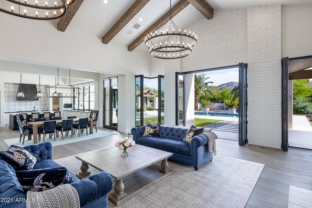 The Modern Hacienda in Coveted Paradise Valley is a luxurious custom home with remarkable quality & workmanship now available for sale. This home located at 5353 E Sanna St, Paradise Valley, Arizona; offering 5 bedrooms and 6 bathrooms with over 6,600 square feet of living spaces.