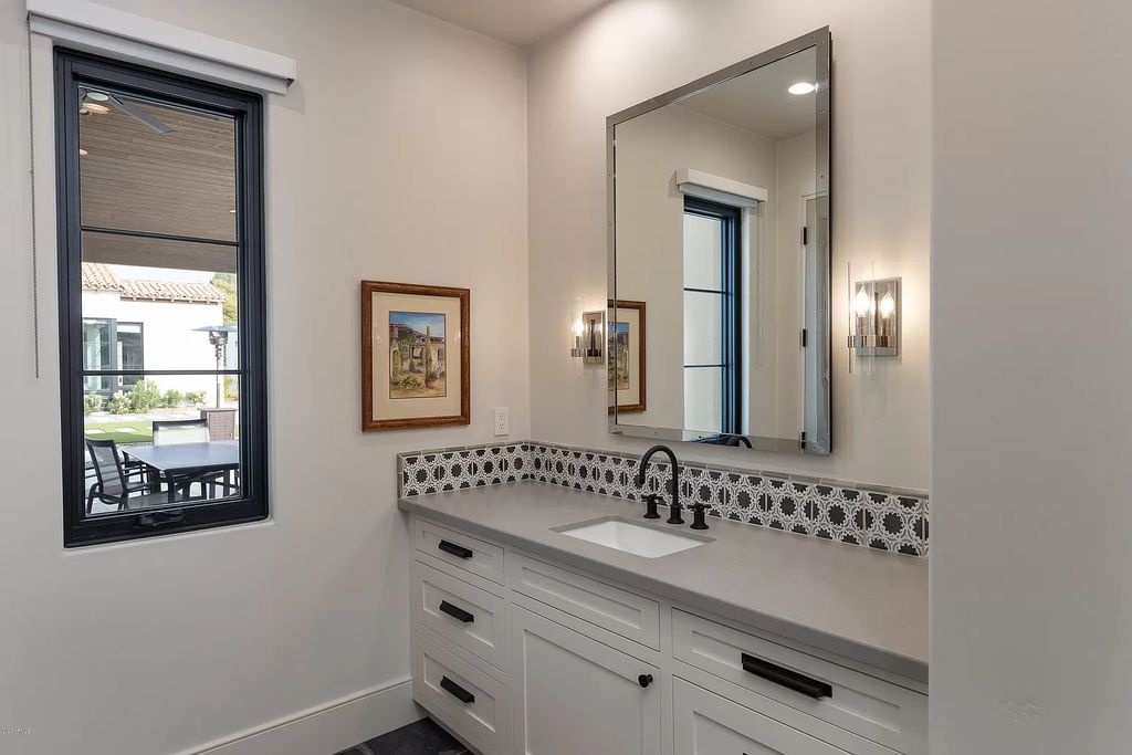 The Modern Hacienda in Coveted Paradise Valley is a luxurious custom home with remarkable quality & workmanship now available for sale. This home located at 5353 E Sanna St, Paradise Valley, Arizona; offering 5 bedrooms and 6 bathrooms with over 6,600 square feet of living spaces.