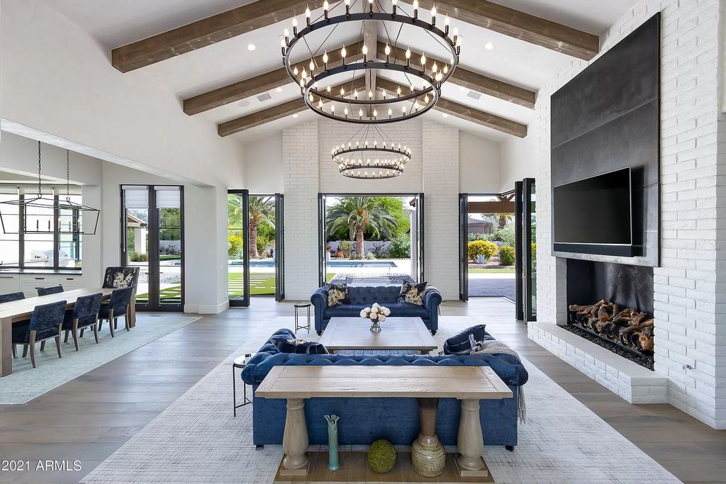 The Modern Hacienda in Coveted Paradise Valley is a luxurious custom home with remarkable quality & workmanship now available for sale. This home located at 5353 E Sanna St, Paradise Valley, Arizona; offering 5 bedrooms and 6 bathrooms with over 6,600 square feet of living spaces.
