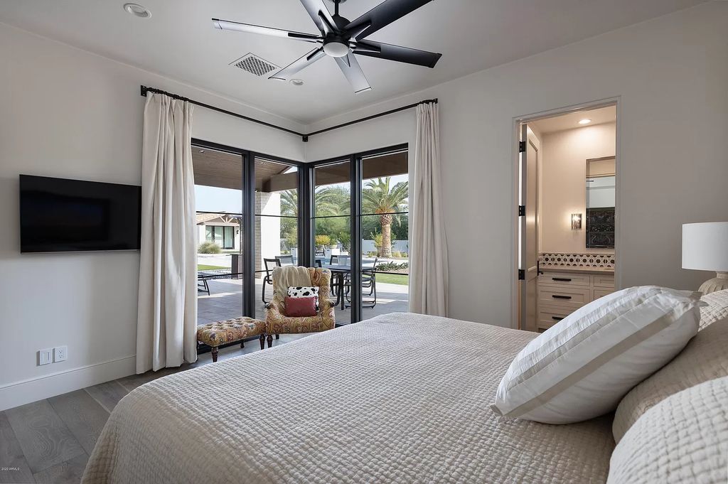 The Modern Hacienda in Coveted Paradise Valley is a luxurious custom home with remarkable quality & workmanship now available for sale. This home located at 5353 E Sanna St, Paradise Valley, Arizona; offering 5 bedrooms and 6 bathrooms with over 6,600 square feet of living spaces.