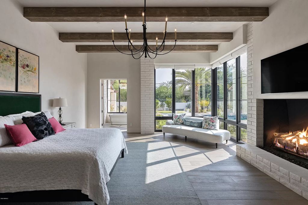 The Modern Hacienda in Coveted Paradise Valley is a luxurious custom home with remarkable quality & workmanship now available for sale. This home located at 5353 E Sanna St, Paradise Valley, Arizona; offering 5 bedrooms and 6 bathrooms with over 6,600 square feet of living spaces.