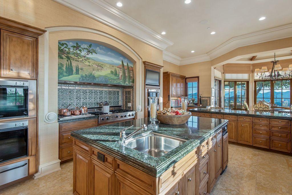 The World Class Italian Villa in Westlake Village is the absolute crown jewel of guard gated North Ranch Country Club Estates now available for sale. This home located at 4994 Summit View Dr, Westlake Village, California; offering 4 bedrooms and 11 bathrooms with over 17,000 square feet of living spaces.