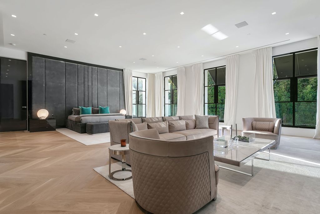 The World Class Trophy Mansion in Los Angeles is a warm contemporary French Manor set in the heart of Old Bel Air now available for sale. This home located at 10701 Bellagio Rd, Los Angeles, California; offering 8 bedrooms and 12 bathrooms with over 24,000 square feet of living spaces.