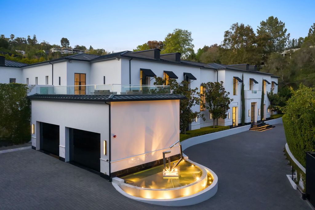 The World Class Trophy Mansion in Los Angeles is a warm contemporary French Manor set in the heart of Old Bel Air now available for sale. This home located at 10701 Bellagio Rd, Los Angeles, California; offering 8 bedrooms and 12 bathrooms with over 24,000 square feet of living spaces.