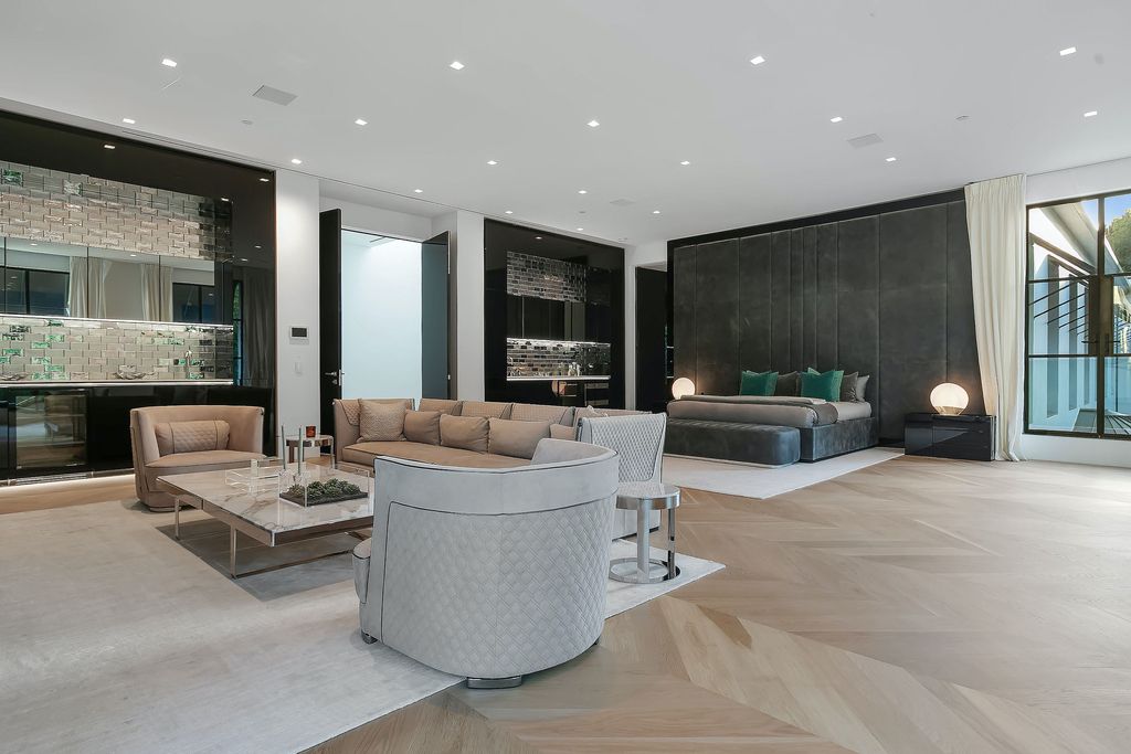 The World Class Trophy Mansion in Los Angeles is a warm contemporary French Manor set in the heart of Old Bel Air now available for sale. This home located at 10701 Bellagio Rd, Los Angeles, California; offering 8 bedrooms and 12 bathrooms with over 24,000 square feet of living spaces.