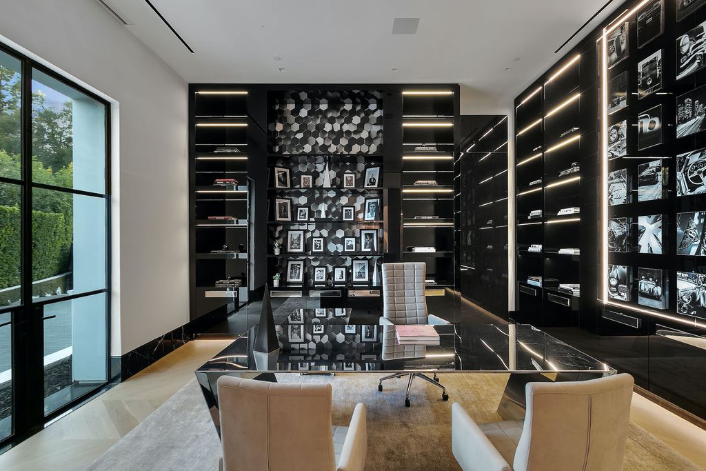 The World Class Trophy Mansion in Los Angeles is a warm contemporary French Manor set in the heart of Old Bel Air now available for sale. This home located at 10701 Bellagio Rd, Los Angeles, California; offering 8 bedrooms and 12 bathrooms with over 24,000 square feet of living spaces.