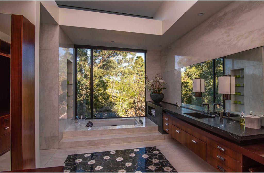 The Architectural Home in Brentwood is an ultra modern design to create comfortable and modern living spaces now available for sale. This home located at 314 N Barrington Ave, Los Angeles, California; offering 5 bedrooms and 9 bathrooms with over 8,000 square feet of living spaces.