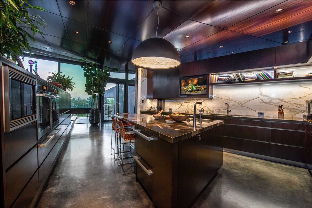 The Architectural Home in Brentwood is an ultra modern design to create comfortable and modern living spaces now available for sale. This home located at 314 N Barrington Ave, Los Angeles, California; offering 5 bedrooms and 9 bathrooms with over 8,000 square feet of living spaces.