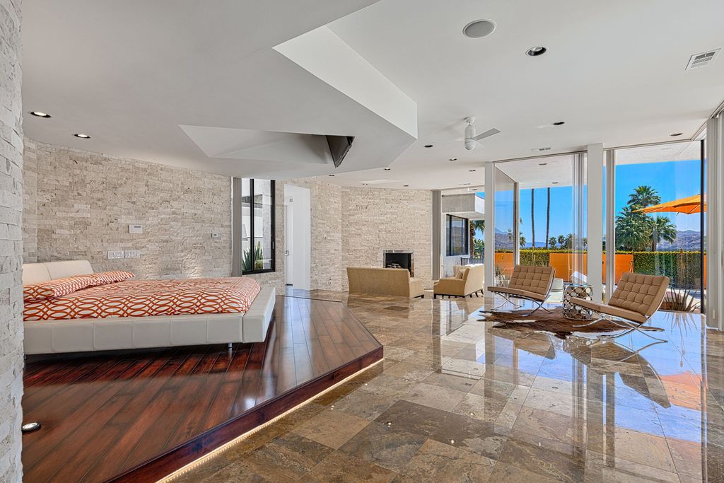 The Palm Springs Hills Modern Home is a iconic estate by John Walling and McCallum with incredible mountain and valley views now available for sale. This home located at 700 W Stevens Rd, Palm Springs, California; offering 6 bedrooms and 8 bathrooms with over 13,000 square feet of living spaces.