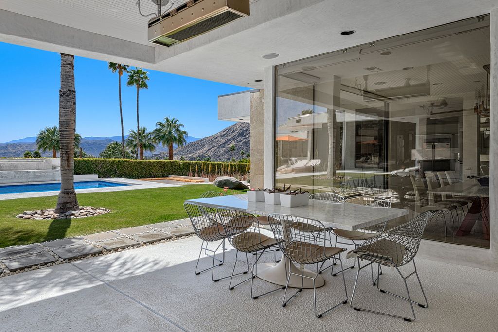 The Palm Springs Hills Modern Home is a iconic estate by John Walling and McCallum with incredible mountain and valley views now available for sale. This home located at 700 W Stevens Rd, Palm Springs, California; offering 6 bedrooms and 8 bathrooms with over 13,000 square feet of living spaces.