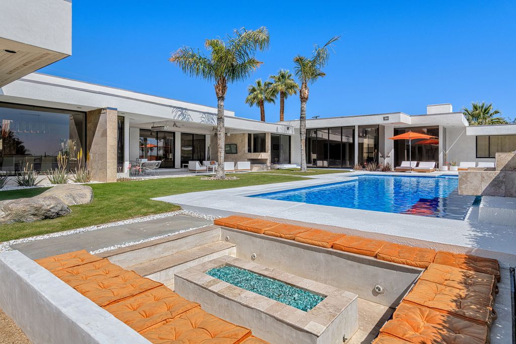 The Palm Springs Hills Modern Home is a iconic estate by John Walling and McCallum with incredible mountain and valley views now available for sale. This home located at 700 W Stevens Rd, Palm Springs, California; offering 6 bedrooms and 8 bathrooms with over 13,000 square feet of living spaces.