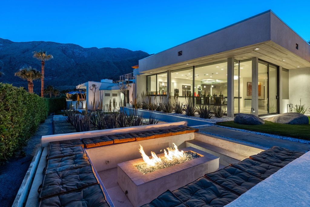 The Palm Springs Hills Modern Home is a iconic estate by John Walling and McCallum with incredible mountain and valley views now available for sale. This home located at 700 W Stevens Rd, Palm Springs, California; offering 6 bedrooms and 8 bathrooms with over 13,000 square feet of living spaces.