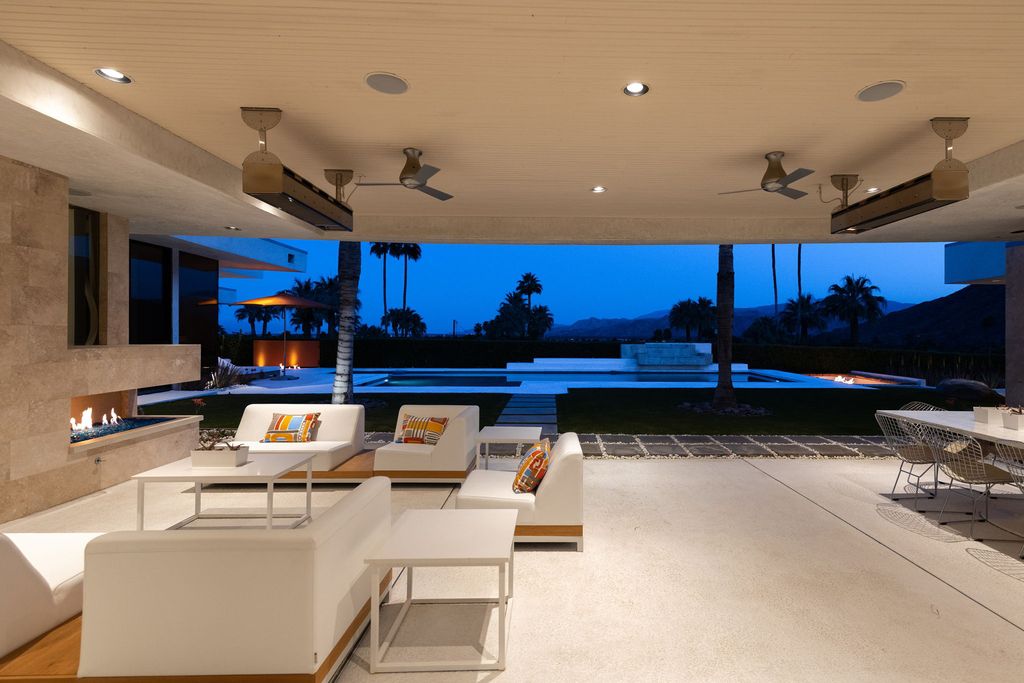 The Palm Springs Hills Modern Home is a iconic estate by John Walling and McCallum with incredible mountain and valley views now available for sale. This home located at 700 W Stevens Rd, Palm Springs, California; offering 6 bedrooms and 8 bathrooms with over 13,000 square feet of living spaces.