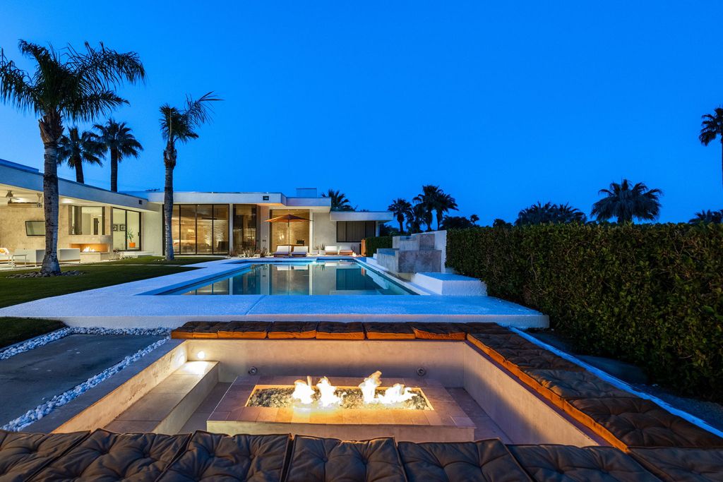 The Palm Springs Hills Modern Home is a iconic estate by John Walling and McCallum with incredible mountain and valley views now available for sale. This home located at 700 W Stevens Rd, Palm Springs, California; offering 6 bedrooms and 8 bathrooms with over 13,000 square feet of living spaces.