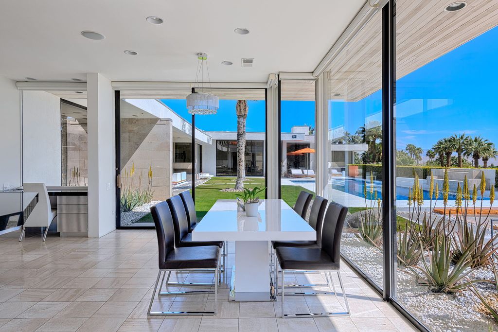 The Palm Springs Hills Modern Home is a iconic estate by John Walling and McCallum with incredible mountain and valley views now available for sale. This home located at 700 W Stevens Rd, Palm Springs, California; offering 6 bedrooms and 8 bathrooms with over 13,000 square feet of living spaces.