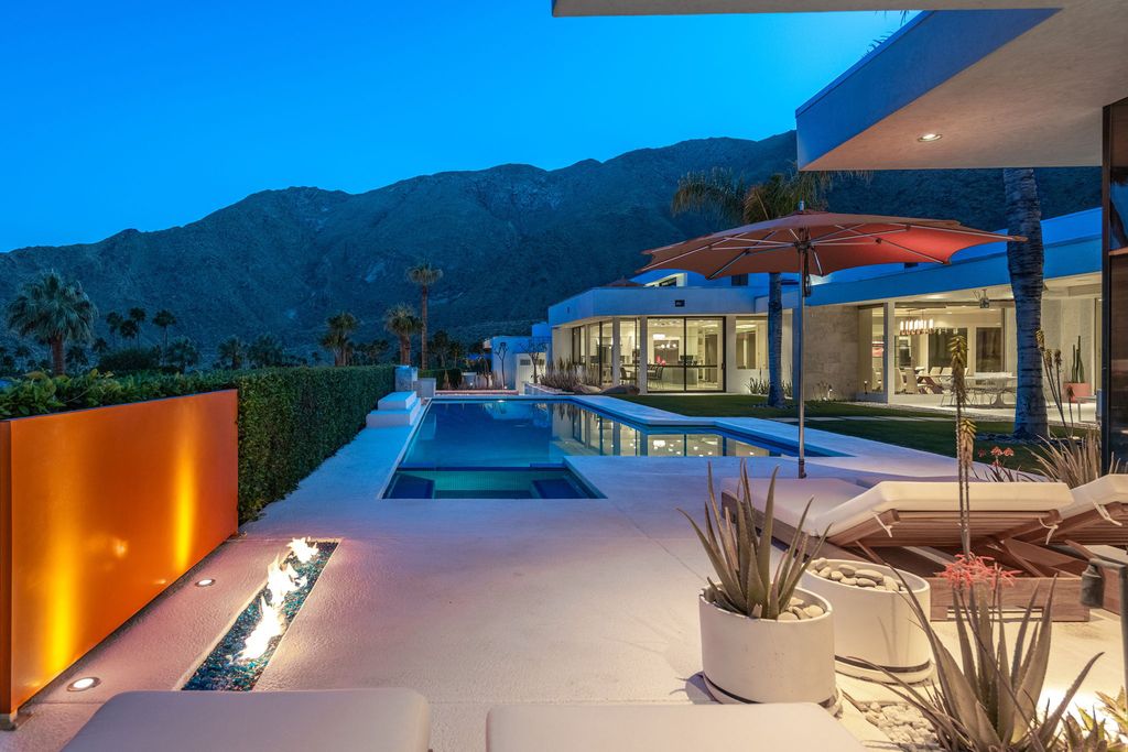 The Palm Springs Hills Modern Home is a iconic estate by John Walling and McCallum with incredible mountain and valley views now available for sale. This home located at 700 W Stevens Rd, Palm Springs, California; offering 6 bedrooms and 8 bathrooms with over 13,000 square feet of living spaces.
