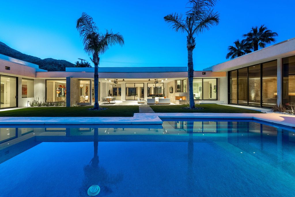 The Palm Springs Hills Modern Home is a iconic estate by John Walling and McCallum with incredible mountain and valley views now available for sale. This home located at 700 W Stevens Rd, Palm Springs, California; offering 6 bedrooms and 8 bathrooms with over 13,000 square feet of living spaces.