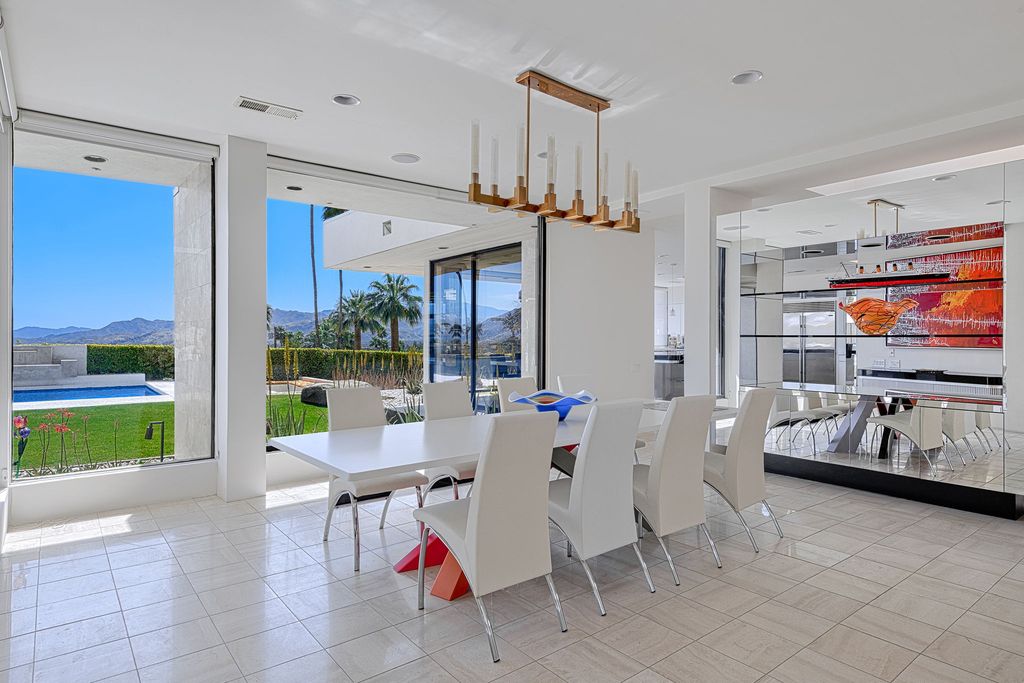 The Palm Springs Hills Modern Home is a iconic estate by John Walling and McCallum with incredible mountain and valley views now available for sale. This home located at 700 W Stevens Rd, Palm Springs, California; offering 6 bedrooms and 8 bathrooms with over 13,000 square feet of living spaces.