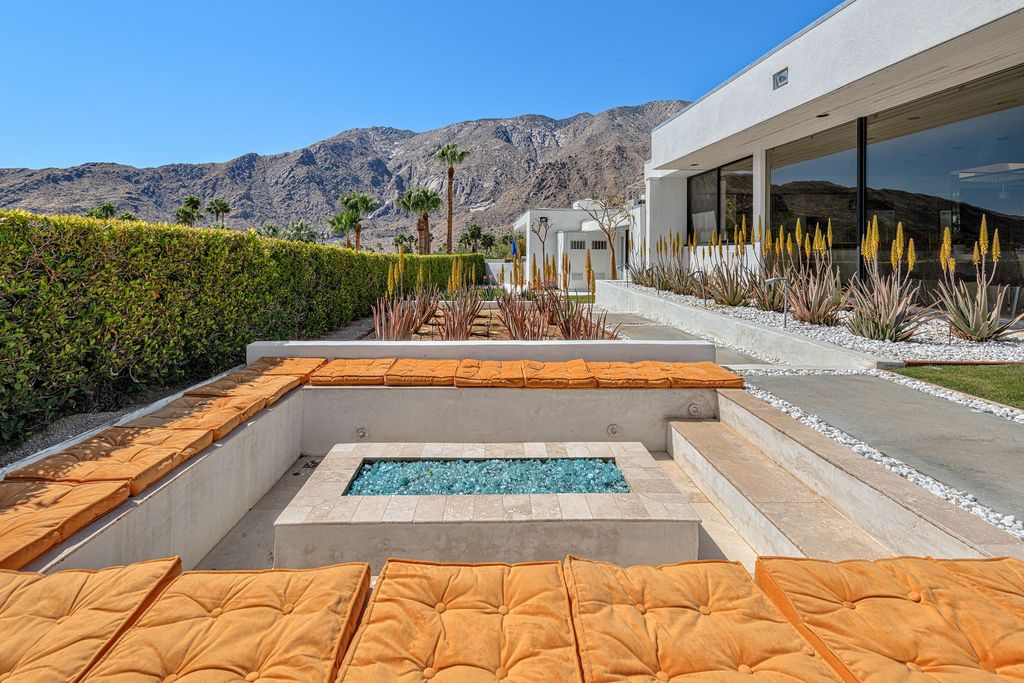 The Palm Springs Hills Modern Home is a iconic estate by John Walling and McCallum with incredible mountain and valley views now available for sale. This home located at 700 W Stevens Rd, Palm Springs, California; offering 6 bedrooms and 8 bathrooms with over 13,000 square feet of living spaces.