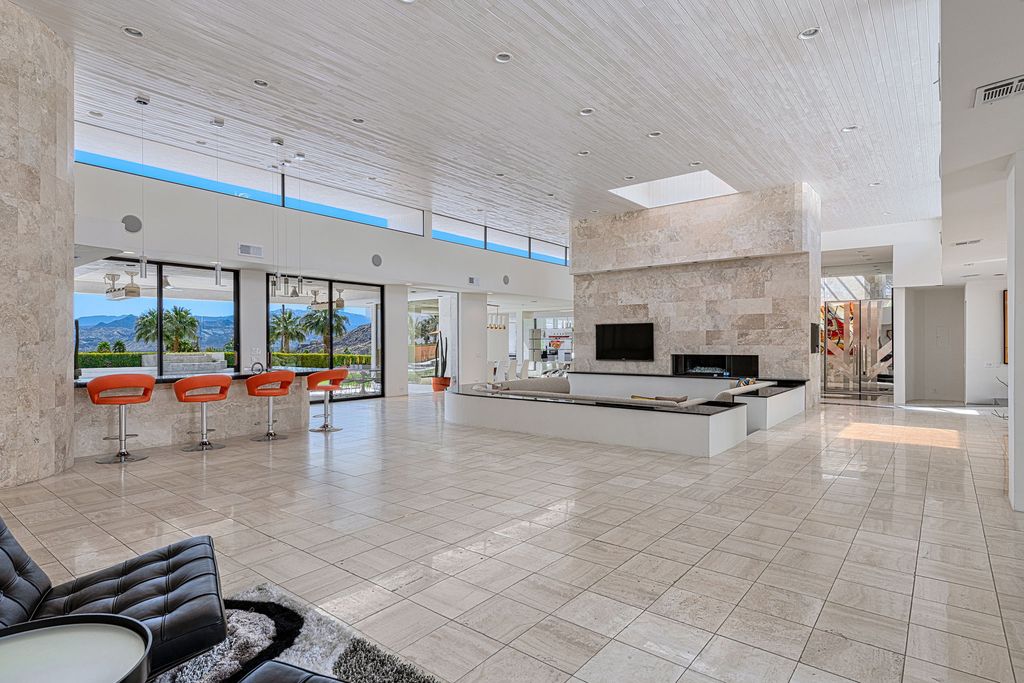The Palm Springs Hills Modern Home is a iconic estate by John Walling and McCallum with incredible mountain and valley views now available for sale. This home located at 700 W Stevens Rd, Palm Springs, California; offering 6 bedrooms and 8 bathrooms with over 13,000 square feet of living spaces.