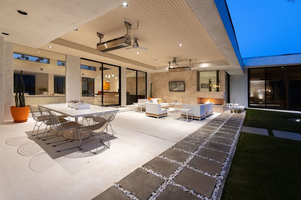 The Palm Springs Hills Modern Home is a iconic estate by John Walling and McCallum with incredible mountain and valley views now available for sale. This home located at 700 W Stevens Rd, Palm Springs, California; offering 6 bedrooms and 8 bathrooms with over 13,000 square feet of living spaces.