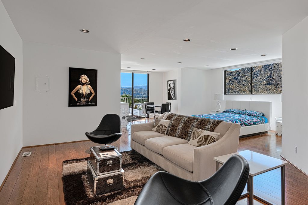 The Palm Springs Hills Modern Home is a iconic estate by John Walling and McCallum with incredible mountain and valley views now available for sale. This home located at 700 W Stevens Rd, Palm Springs, California; offering 6 bedrooms and 8 bathrooms with over 13,000 square feet of living spaces.