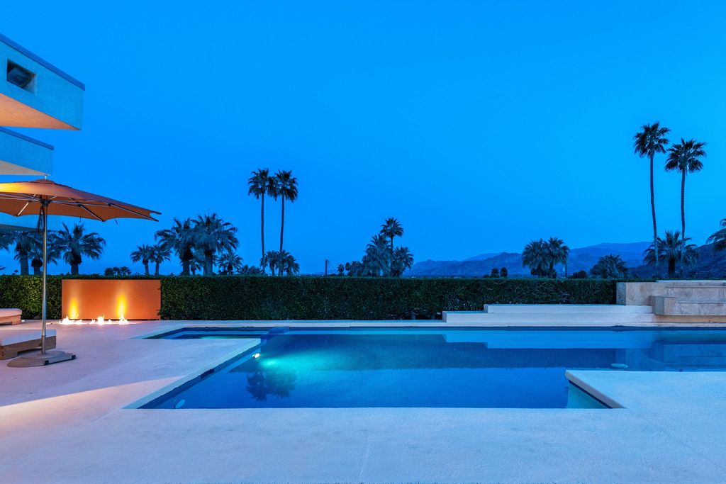 The Palm Springs Hills Modern Home is a iconic estate by John Walling and McCallum with incredible mountain and valley views now available for sale. This home located at 700 W Stevens Rd, Palm Springs, California; offering 6 bedrooms and 8 bathrooms with over 13,000 square feet of living spaces.