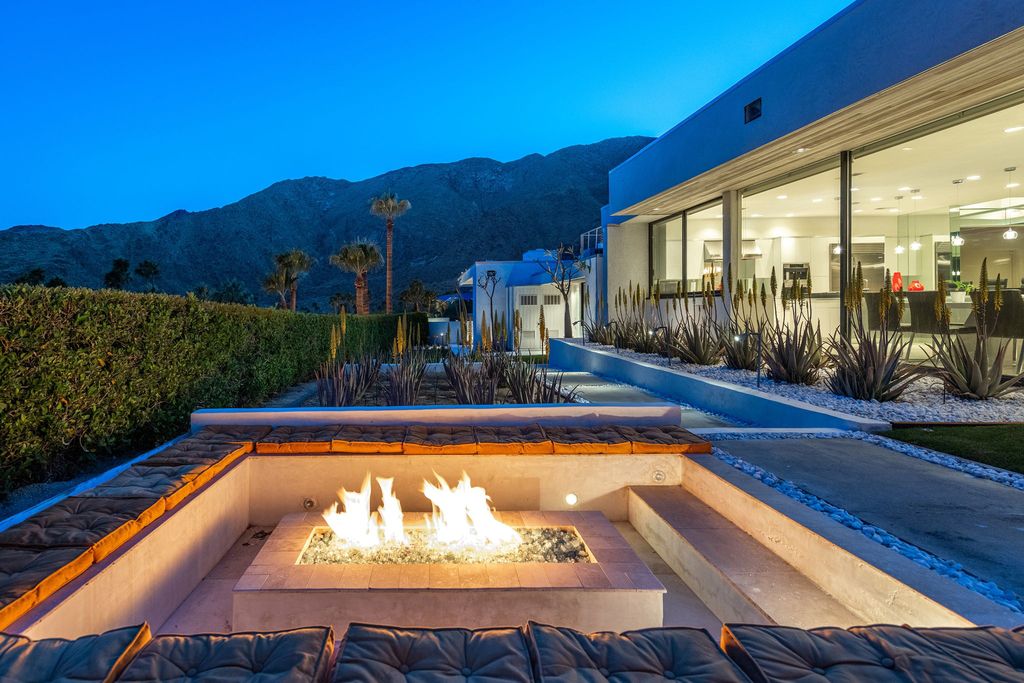 The Palm Springs Hills Modern Home is a iconic estate by John Walling and McCallum with incredible mountain and valley views now available for sale. This home located at 700 W Stevens Rd, Palm Springs, California; offering 6 bedrooms and 8 bathrooms with over 13,000 square feet of living spaces.