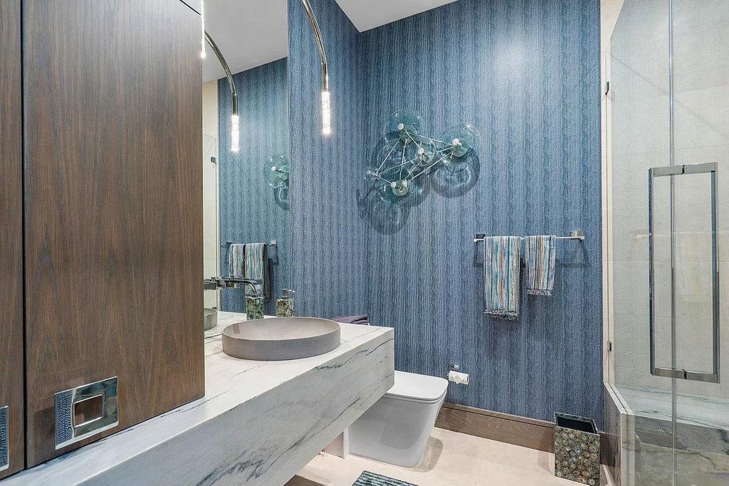 The New Construction Home in Boca Raton is a modern masterpiece was built at highest standards of luxury level now available for sale. This home located at 144 W Coconut Palm Rd, Boca Raton, Florida; offering 7 bedrooms and 10 bathrooms with over 8,500 square feet of living spaces.