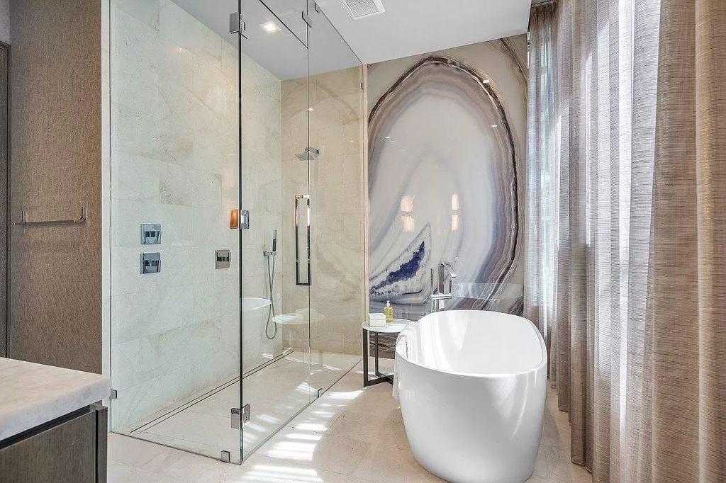 The New Construction Home in Boca Raton is a modern masterpiece was built at highest standards of luxury level now available for sale. This home located at 144 W Coconut Palm Rd, Boca Raton, Florida; offering 7 bedrooms and 10 bathrooms with over 8,500 square feet of living spaces.