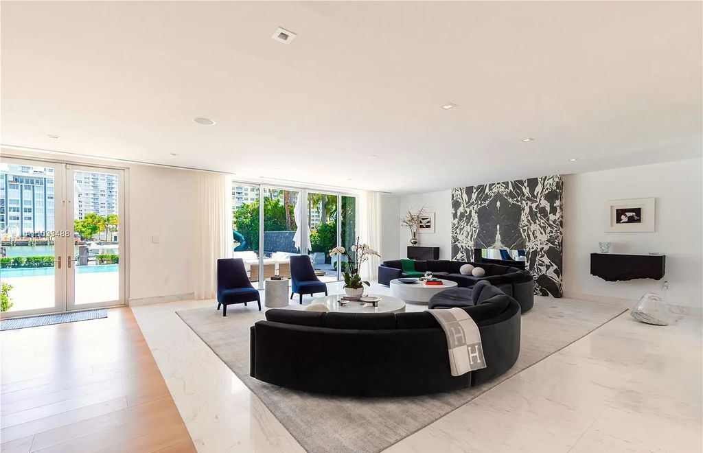 The Modern Waterfront Villa in Miami Beach is a luxurious home on Pine Tree Drive ideal for entertaining now available for sale. This home located at 5711 Pine Tree Dr, Miami Beach, Florida; offering 7 bedrooms and 9 bathrooms with over 8,000 square feet of living spaces.