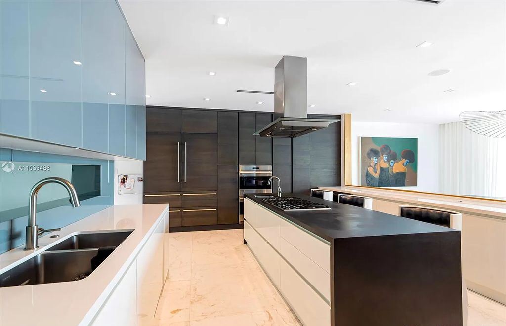 The Modern Waterfront Villa in Miami Beach is a luxurious home on Pine Tree Drive ideal for entertaining now available for sale. This home located at 5711 Pine Tree Dr, Miami Beach, Florida; offering 7 bedrooms and 9 bathrooms with over 8,000 square feet of living spaces.