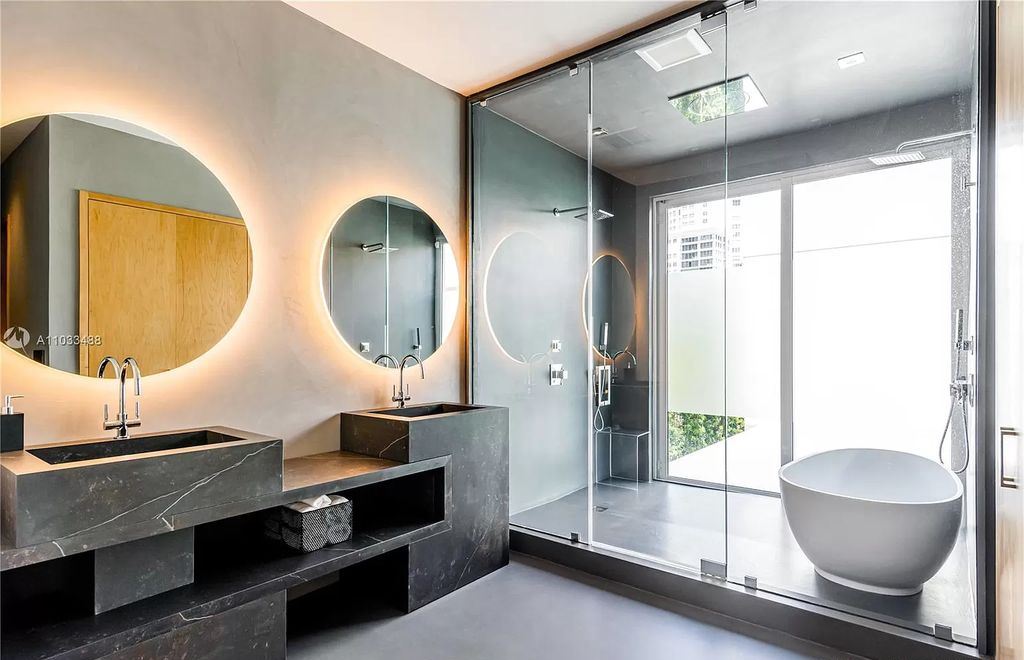 The Modern Waterfront Villa in Miami Beach is a luxurious home on Pine Tree Drive ideal for entertaining now available for sale. This home located at 5711 Pine Tree Dr, Miami Beach, Florida; offering 7 bedrooms and 9 bathrooms with over 8,000 square feet of living spaces.
