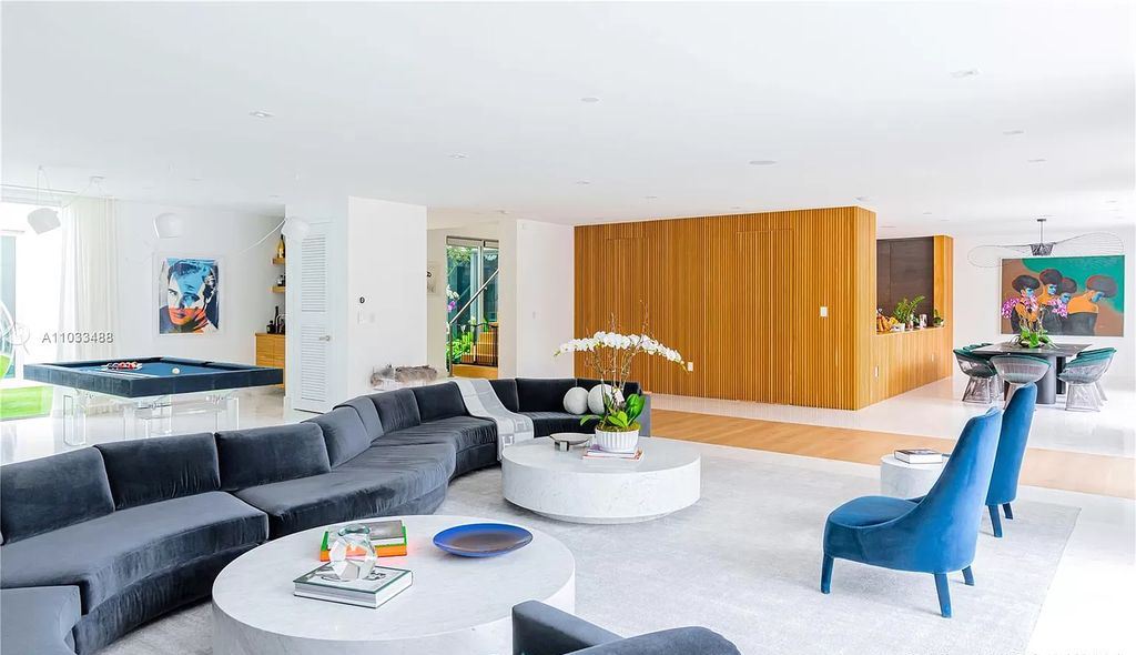 The Modern Waterfront Villa in Miami Beach is a luxurious home on Pine Tree Drive ideal for entertaining now available for sale. This home located at 5711 Pine Tree Dr, Miami Beach, Florida; offering 7 bedrooms and 9 bathrooms with over 8,000 square feet of living spaces.