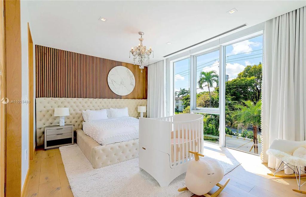 The Modern Waterfront Villa in Miami Beach is a luxurious home on Pine Tree Drive ideal for entertaining now available for sale. This home located at 5711 Pine Tree Dr, Miami Beach, Florida; offering 7 bedrooms and 9 bathrooms with over 8,000 square feet of living spaces.