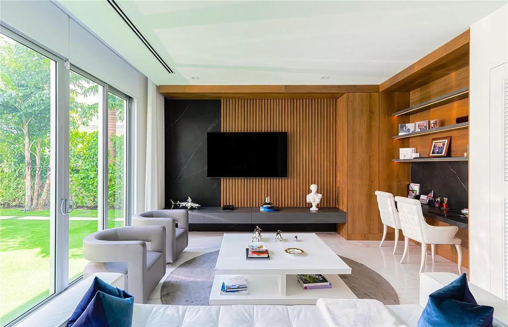 The Modern Waterfront Villa in Miami Beach is a luxurious home on Pine Tree Drive ideal for entertaining now available for sale. This home located at 5711 Pine Tree Dr, Miami Beach, Florida; offering 7 bedrooms and 9 bathrooms with over 8,000 square feet of living spaces.