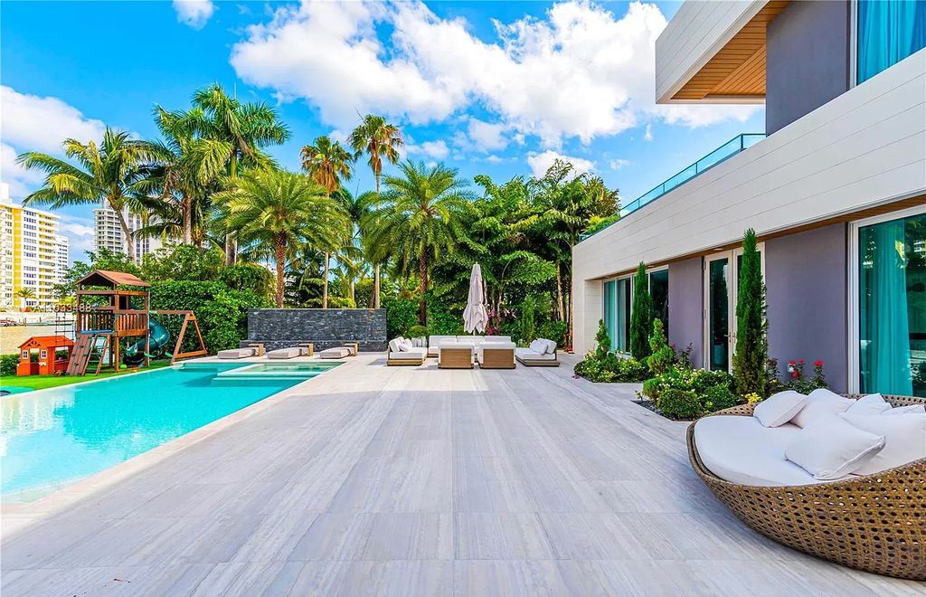 The Modern Waterfront Villa in Miami Beach is a luxurious home on Pine Tree Drive ideal for entertaining now available for sale. This home located at 5711 Pine Tree Dr, Miami Beach, Florida; offering 7 bedrooms and 9 bathrooms with over 8,000 square feet of living spaces.