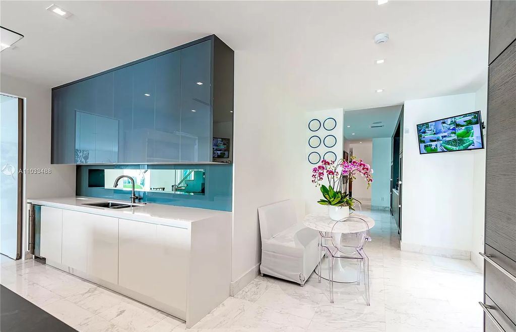 The Modern Waterfront Villa in Miami Beach is a luxurious home on Pine Tree Drive ideal for entertaining now available for sale. This home located at 5711 Pine Tree Dr, Miami Beach, Florida; offering 7 bedrooms and 9 bathrooms with over 8,000 square feet of living spaces.
