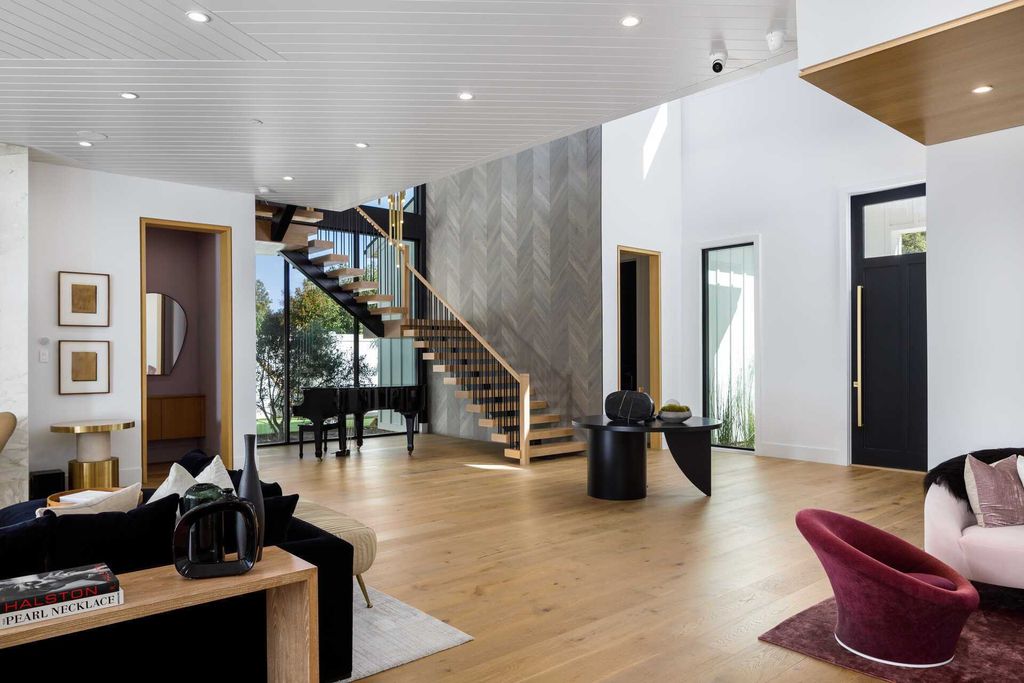 The Modern Farmhouse in Encino is a marvel at the grand scale, gorgeous fixtures, layered textures, and sleek design now available for sale. This home located at 17015 Adlon Rd, Encino, California; offering 6 bedrooms and 10 bathrooms with over 8,900 square feet of living spaces. 